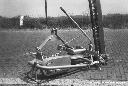 Schukken maaibalk voor in de hef